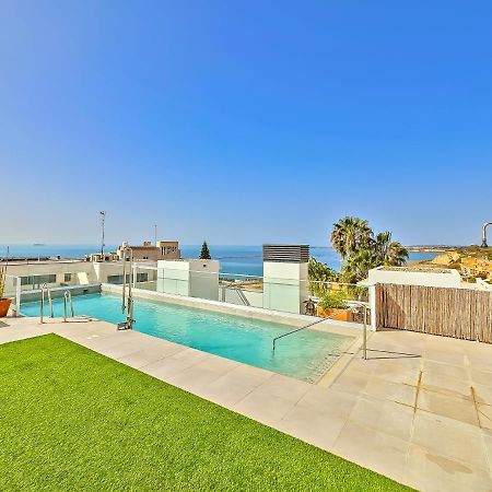 Oceanfront Duplex With A Rooftop Pool And Terrace El Puerto de Santa Maria Bagian luar foto
